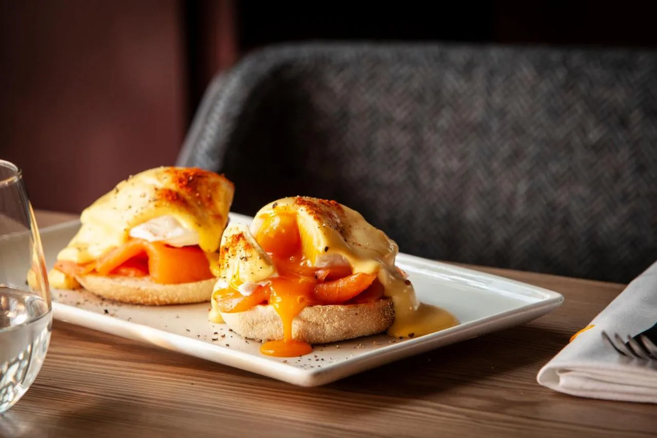 two sandwiches on a plate on a table at The Clermont London, Charing Cross in London